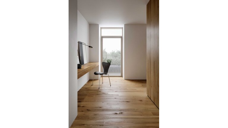 Minimalistisches Home-Office mit Holzfußboden