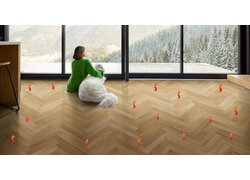 Fußbodenheizung unter Holzparkett mit Winterlandschaft.