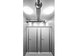 Graue Toilettenkabinen mit runden Metallfüßen.