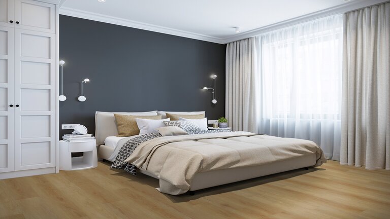 Schlafzimmer mit Holzfußboden und modernen Möbeln.