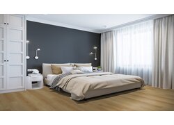 Schlafzimmer mit Holzfußboden und modernen Möbeln.