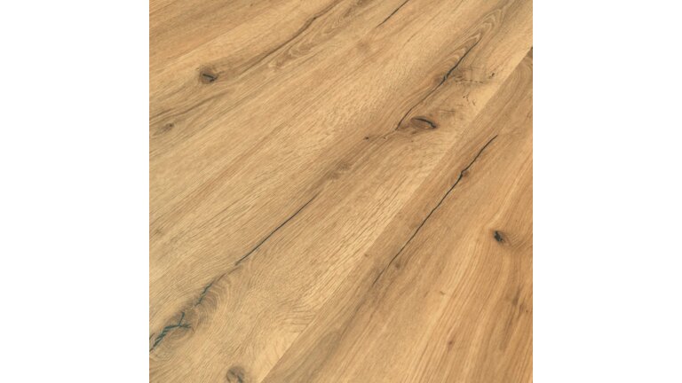 Vinylboden LVT Klebeplanken Nahaufnahme einer Holzoberfläche in Eichenoptik mit natürlicher Maserung.