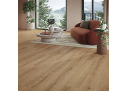 Das Bild zeigt ein stilvolles Wohnzimmer mit einem Vinyl-Designboden mit HDF-Trägerplatte des Modells "Basic 30" , der durch eine warme Holzoptik mit natürlichen Maserungen besticht.