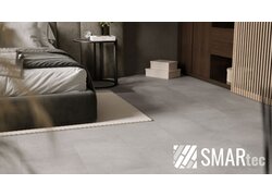 SMARtec Basic Designboden in grauer Betonoptik verbindet modernes Design mit einer dezenten Steinoptik. Ideal für Wohn- und Schlafräume mit zeitgemäßem Ambiente.