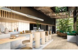 Modernes Café mit Holzfußboden und Pflanzen.