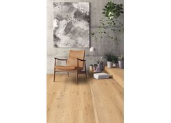 Holzboden, Sessel, Pflanzen, Wandbild, Fenster.