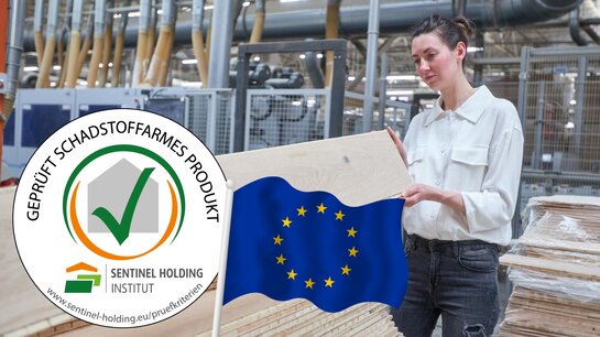 Frau insipiziert Holzplatten. Davor ist das SHI-Schadstoffgeprüft-Siegel mit europäischer Flagge